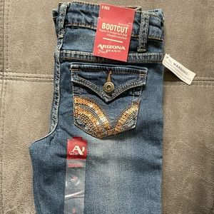 Brand new w/tags Arizona girls blue jeans, classic bootcut. Size 8 Reg.